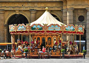 People near the Carousel at Piazza della Reppublica, Florence, Italy