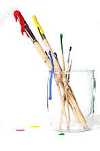 Paint brushes covered in paint