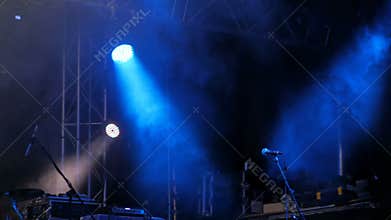 Free stage with blue lights before concert