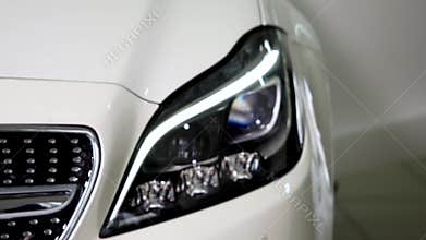 Close-up of a car`s headlights