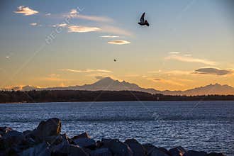 Sunrise over Northern Washington from White Rock, BC, Canada