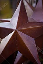 Close up of metal texas lone star/rusty metal star
