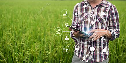 Agriculture technology farmer man using tablet computer.