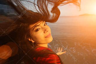 Happy woman ocean hair