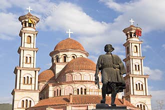 Statue and orthodox church, Korca, Albania