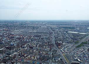Aerial panoramic view of the town of blackpool looking east showing the streets and roads of the town with lancashire countryside