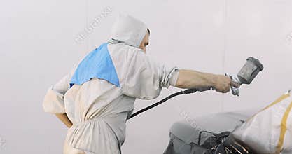 Car painting with professional spray gun