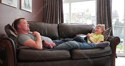 Relaxing at home with dad