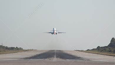 Airplane take-off from airport runway