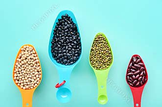 Assortment of beans in spoon