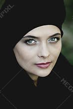 Portrait of a beautiful muslim woman. Young arabian woman in hijab