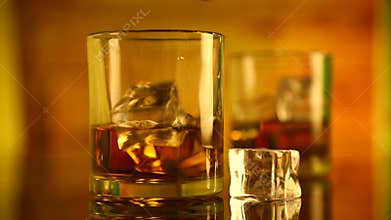Alcohol Whiskey and Ice Cubes in a Glass