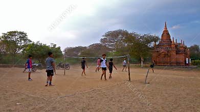 Playing teens in Old Bagan, Myanmar