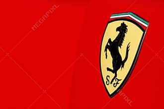 Ferrari logo on red sport car
