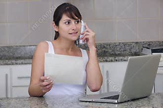 Woman on phone with bill