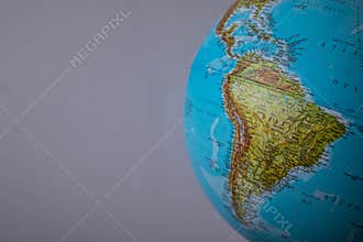 South America map on a globe with a white background