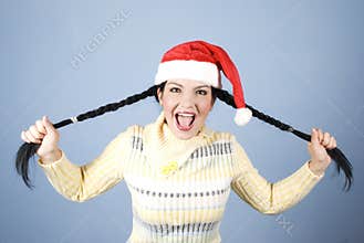 Funny Xmas girl pulling pigtails