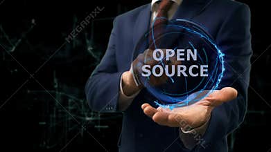 Businessman shows concept hologram Open source on his hand