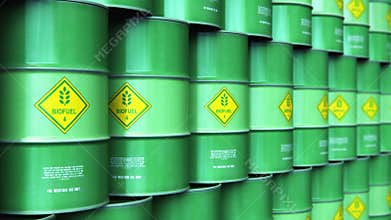 Group of rows of green stacked biofuel drums in storage warehouse