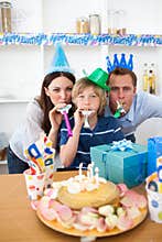Happy parents celebrating their son's birthday