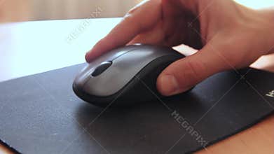 Wireless mouse on the computer mat