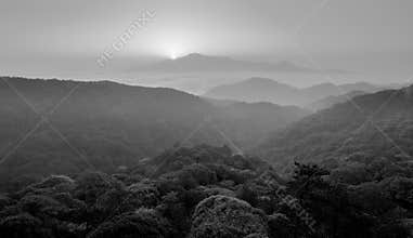Sunrise in the mist, black and white image