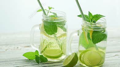 Glass jars filled with refreshing lemonade