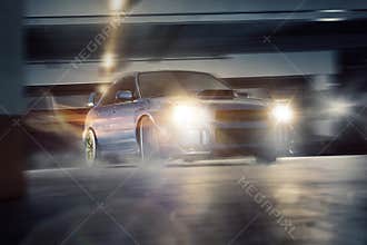 Tuned car drifting in an underground parking lot