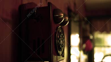 Hand picks up and hangs up old landline phone