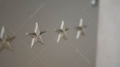 Five star sign on rich elite establishment hotel, restaurant or shop