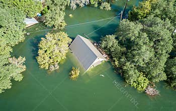 Climate Change Flooding with a House Under water