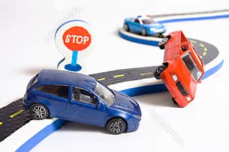 two cars accident crash on road, broken toys auto car, insurance