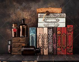 Vintage books, pharmacy bottles, manuscript with a wax seal on the shelf.