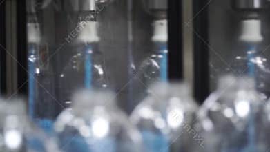 Bottle. Industrial production of plastic pet bottles. Clip. Factory line for manufacturing polyethylene bottles