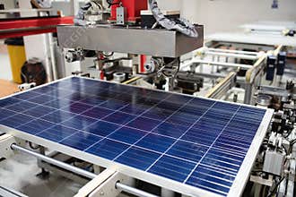 Manufacturing of solar panel system in factory.Industry concept