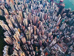 Aerial view of Hong Kong Downtown. Financial district and business centers in smart city in Asia. Top view of skyscraper and high