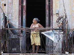 Woman On Balcony In Havana Cuba