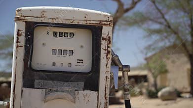 Old abandoned gas station. Rusty broken closed gas station in the desert.