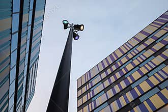 Colorful quirky building exteriors and matching colourful Street lamp Belgium