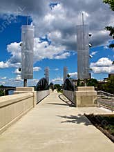 Riverwalk Bridge With Modern Art