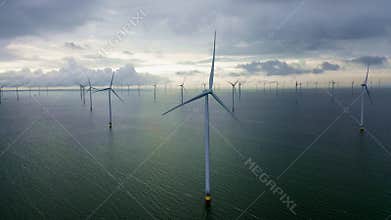 Aerial view. Huge windmills stand in the sea along the Dutch IJsselmeer
