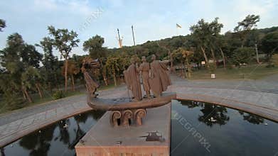FPV drone footage. Fly over Kyiv Founders Monument at sunrise. Ukraine, Kyiv - 10 august 2021.
