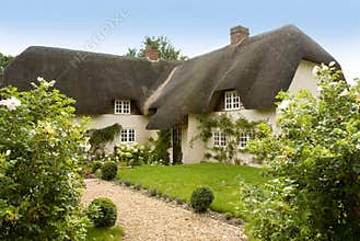 Traditional English thatched country cottage