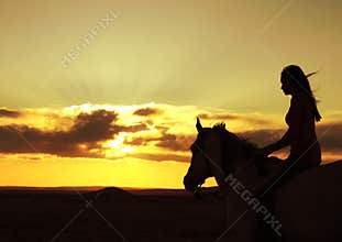 Woman and Horse Watching Sunset Silhouette