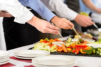 Business catering people take buffet food