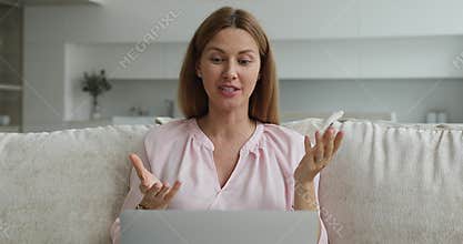 Woman provide assistance to client remotely use videocall on laptop