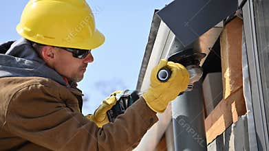Contruction Worker Removing Metal Elements Using Circular Saw