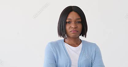 Offended woman over white background