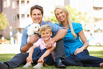 Family in Park with Dog
