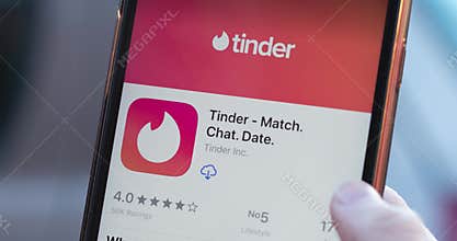 New York  USA - 1 December 2020: Tinder app logo close-up on phone screen
